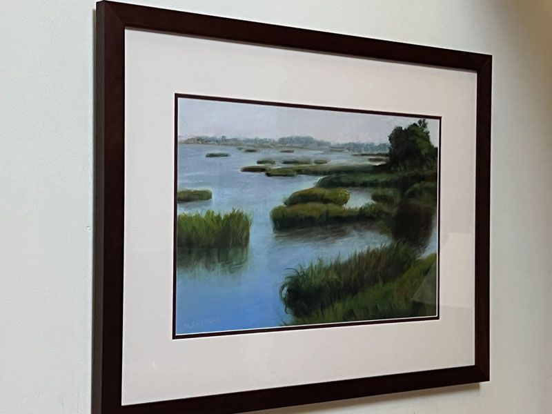 framed oil painting of a marsh